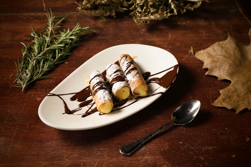 Cannoli filled with sweet ricotta cream and chocolate chips
